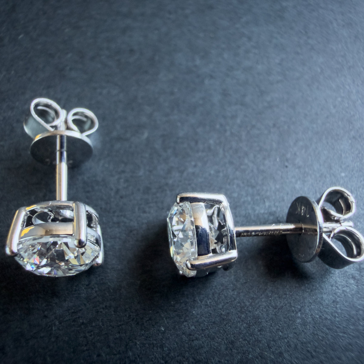 1.00 TCW lab-grown diamond stud earrings in 14kt white gold side view