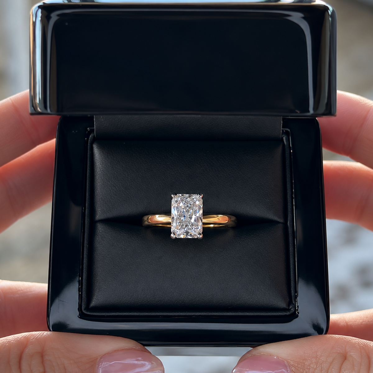 2.04 carat radiant-cut solitaire diamond ring in yellow gold presentation box