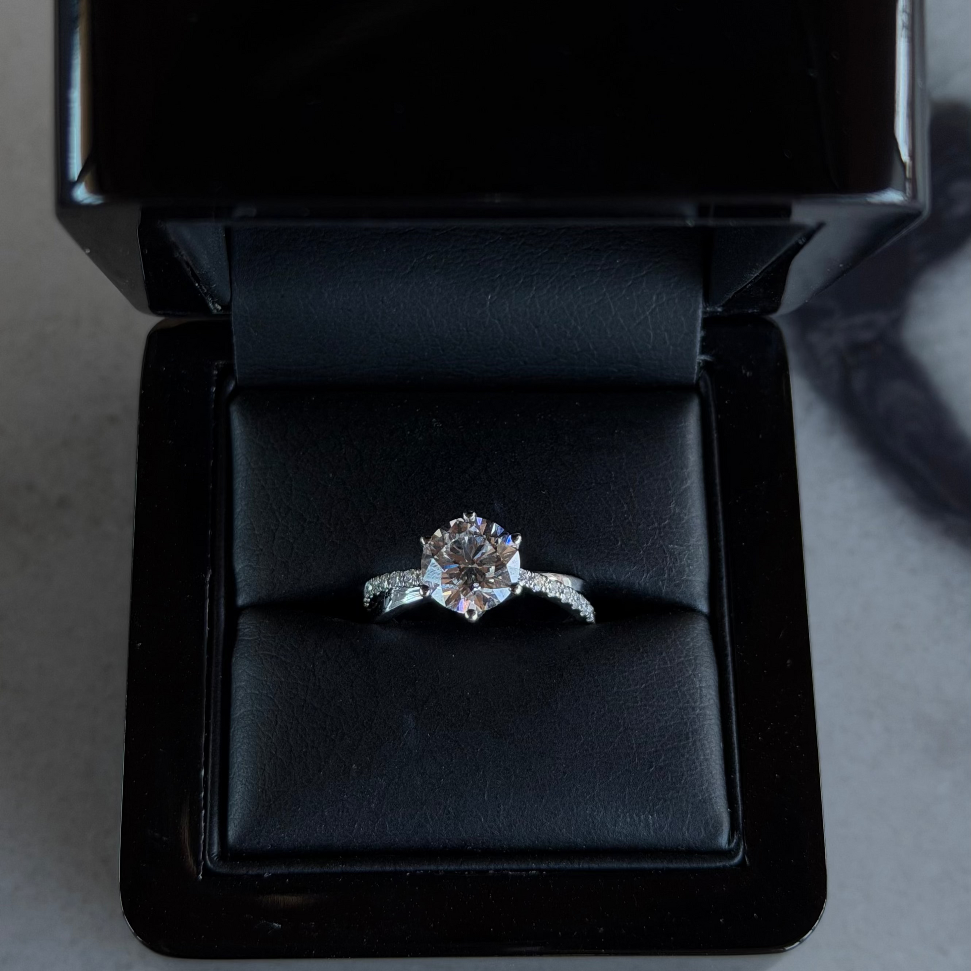 2.05 carat round brilliant-cut crossover diamond ring in white gold
