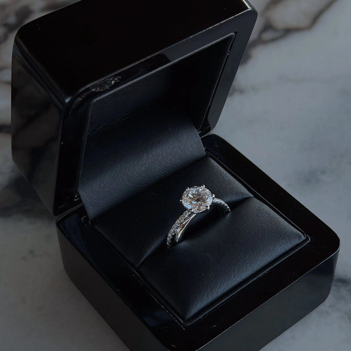 2.05 carat round brilliant-cut crossover diamond ring in white gold