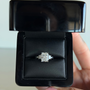 2.56 total carat radiant-cut three-stone diamond ring in white gold