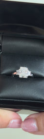 2.56 total carat radiant-cut three-stone diamond ring in white gold