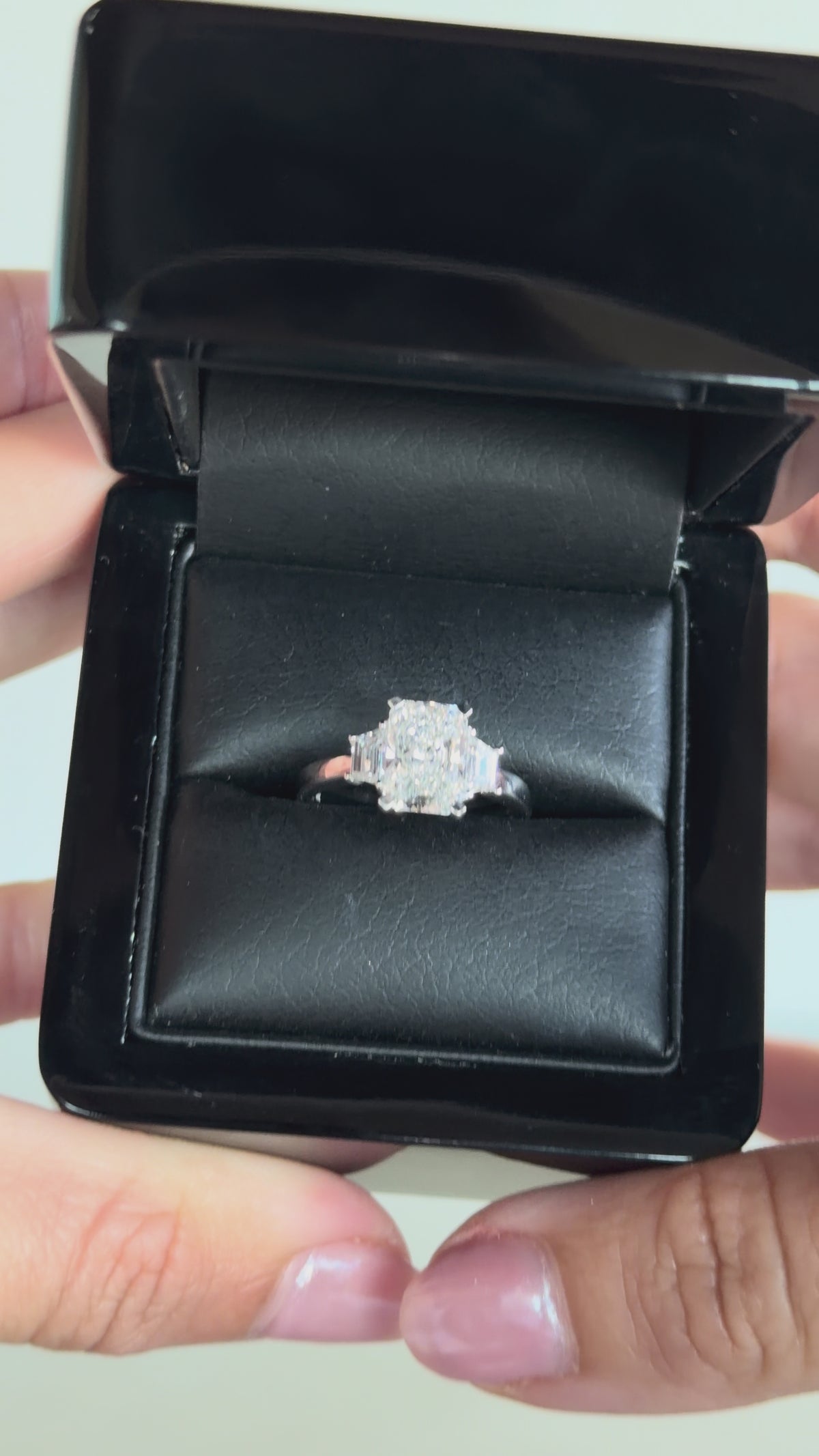 2.56 total carat radiant-cut three-stone diamond ring in white gold