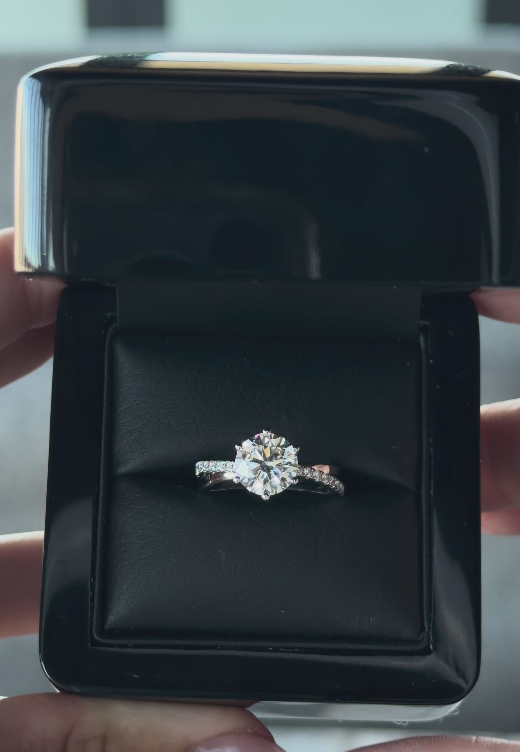2.05 carat round brilliant-cut crossover diamond ring in white gold